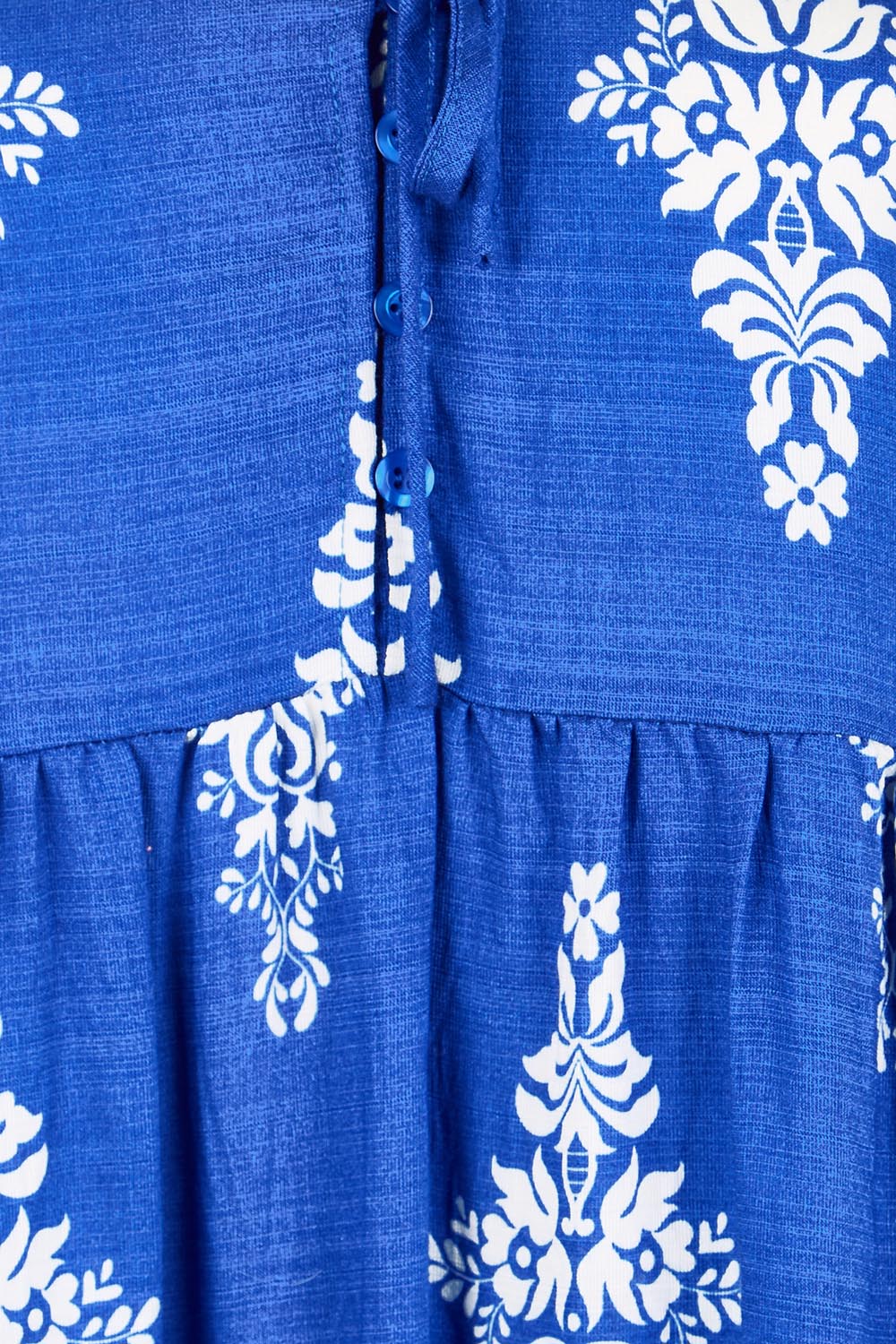 Product shot of the Sunset Happy Hour Dress – Royal in colour Royal, showing detail