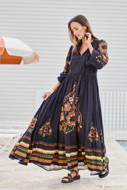 Model Tegand wearing size 10 of the With My Loves Folk Maxi Dress – Nightfolk in colour Nightfolk, from the front