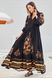 Model Tegand wearing size 10 of the With My Loves Folk Maxi Dress – Nightfolk in colour Nightfolk, from the front