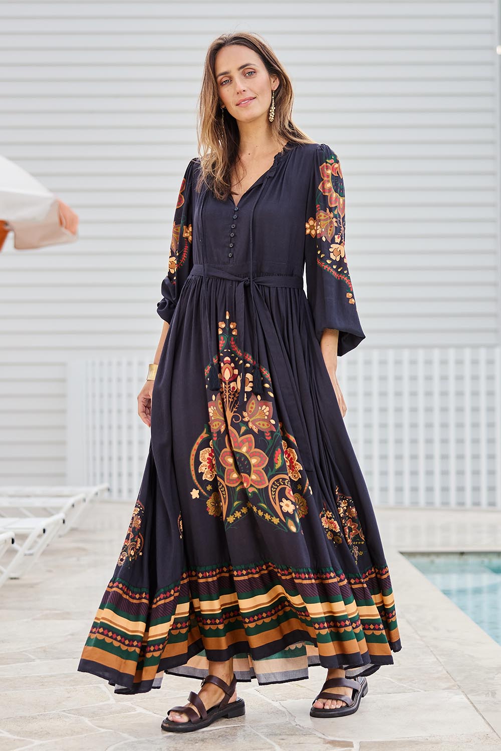 Model Tegand wearing size 10 of the With My Loves Folk Maxi Dress – Nightfolk in colour Nightfolk, from the front