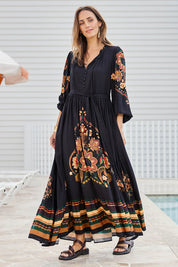 Model Tegand wearing size 10 of the With My Loves Folk Maxi Dress – Nightfolk in colour Nightfolk, from the front