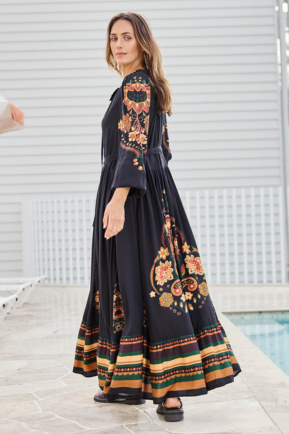 Model Tegand wearing size 10 of the With My Loves Folk Maxi Dress – Nightfolk in colour Nightfolk, from the front
