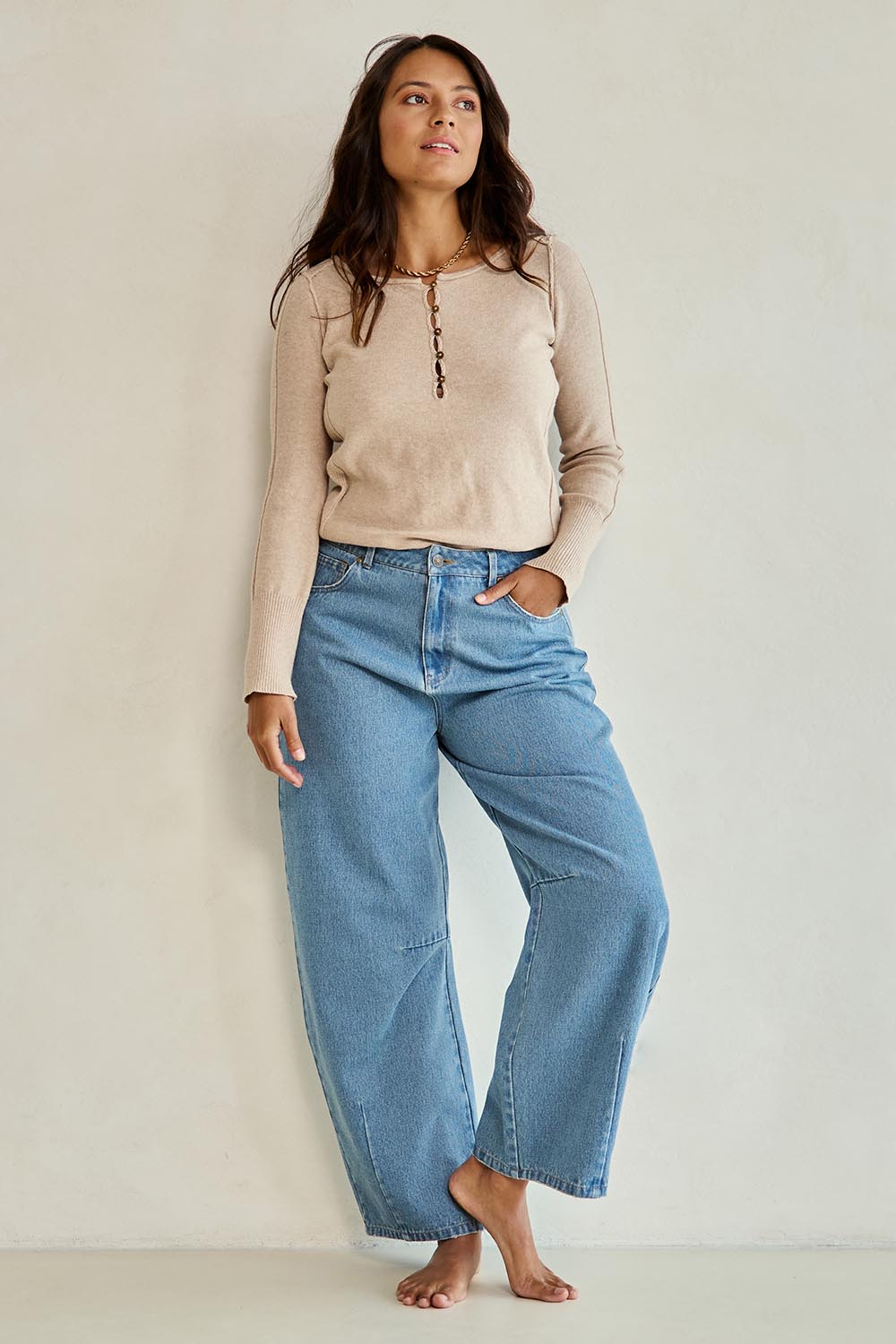 Model Tahnee wearing size 10 of the Dusk To Dawn Cotton  Slouch Barrel Jeans in colour Denim (Blue), from the front, showing the whole outfit