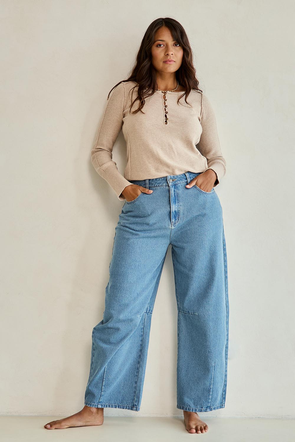 Model Tahnee wearing size 10 of the Dusk To Dawn Cotton  Slouch Barrel Jeans in colour Denim (Blue), from the front, showing the whole outfit