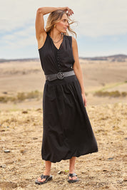 Model Tegan wearing size 10 of the Cute As A Button Cotton Tank in colour Black (Black), from the front, showing the whole outfit