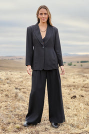 Model Tegan wearing size 10 of the All The Right Moves Blazer in colour Black (Black), from the front, showing the whole outfit