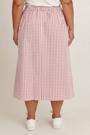 Model Ashleigh wearing size 16 of the Giddy For Gingham Cotton Blend Skirt in colour Rosecheck (Pink), from the back