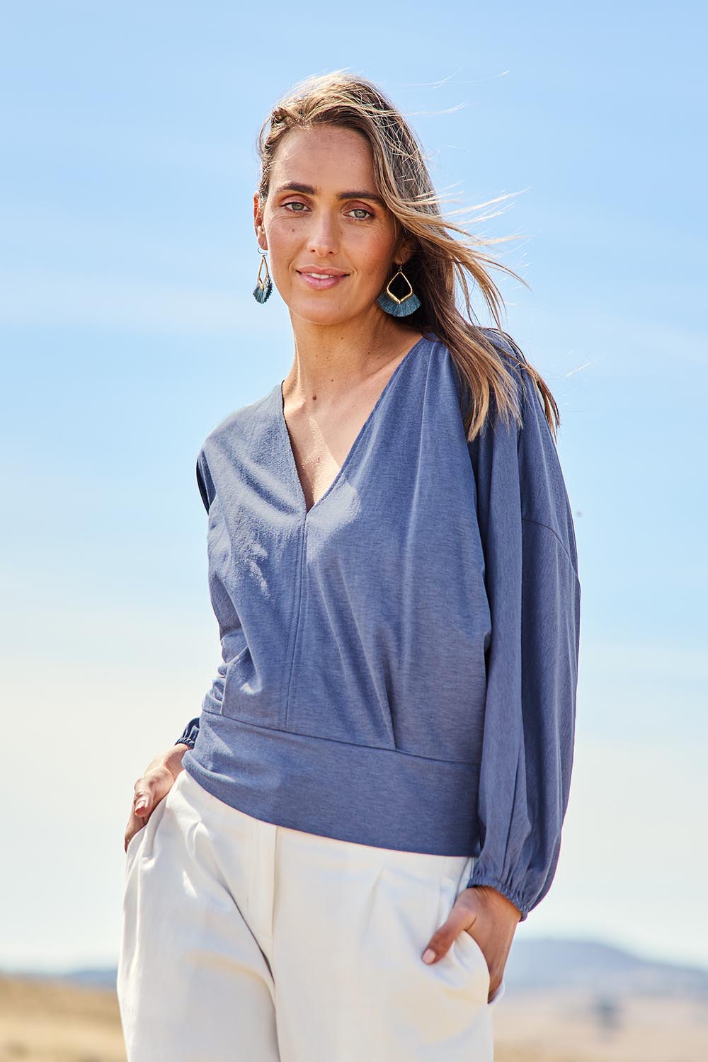 Model Tegan wearing size 10 of the Always Need You Top in colour Steelblue (Blue), from the front, showing the whole outfit