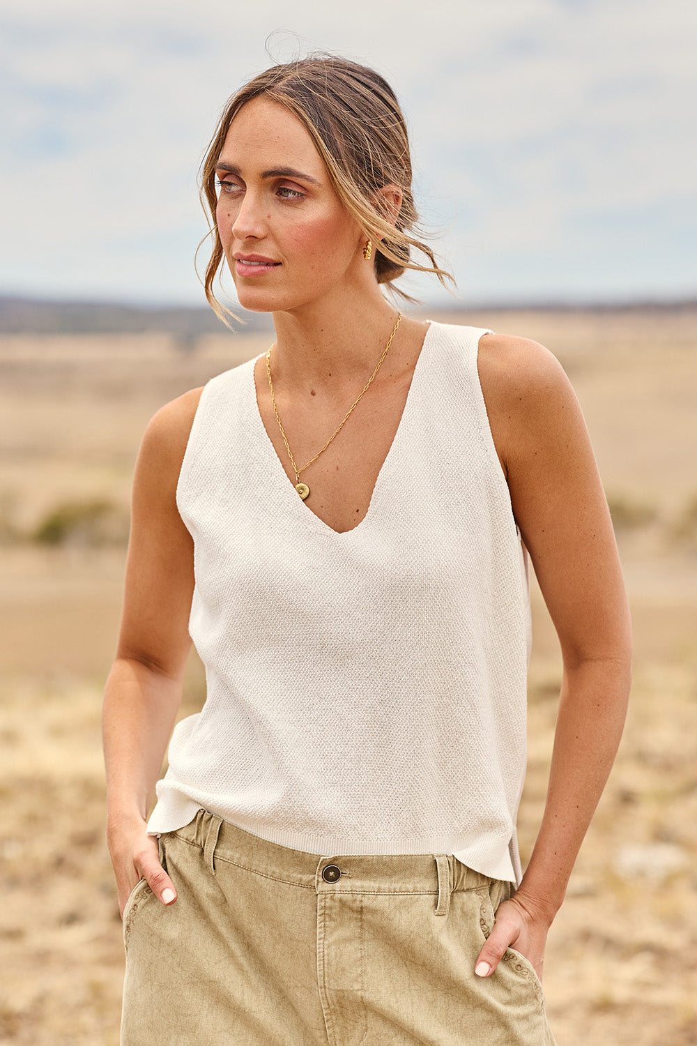 Model Tegan wearing size S of the Forever Yours Fine Cotton Knit Tank in colour Milk (White), from the front, cropped image