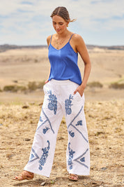 Model Tegan wearing size 10 of the Morning Sun Embroidered Cotton Pants in colour Whiteblue (Blue), from the front, showing the whole outfit