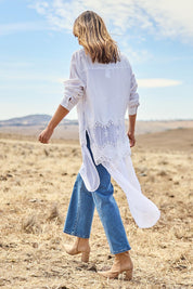Model Tegan wearing size 10 of the My Sweetheart Longline Shirt in colour White (White), from the front, showing the whole outfit