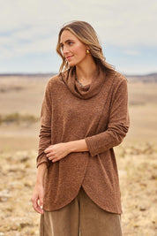 Model Tegan wearing size 10 of the Crossing The Plains Snuggle Jumper in colour Chocolate, from the front, showing the whole outfit
