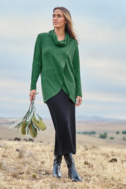Model Tegan wearing size 10 of the Crossing The Plains Snuggle Jumper in colour Forest (Green), from the front, showing the whole outfit