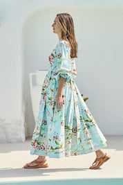 Model Tegand wearing size 10 of the Walking On Sunshine Cotton Maxi Wrap Dress – Skybloom in colour Skybloom, from the front