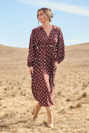 Model Tegan wearing size 10 of the I Can Always Spot You Midi Dress in colour Chocspot, from the front, showing the whole outfit
