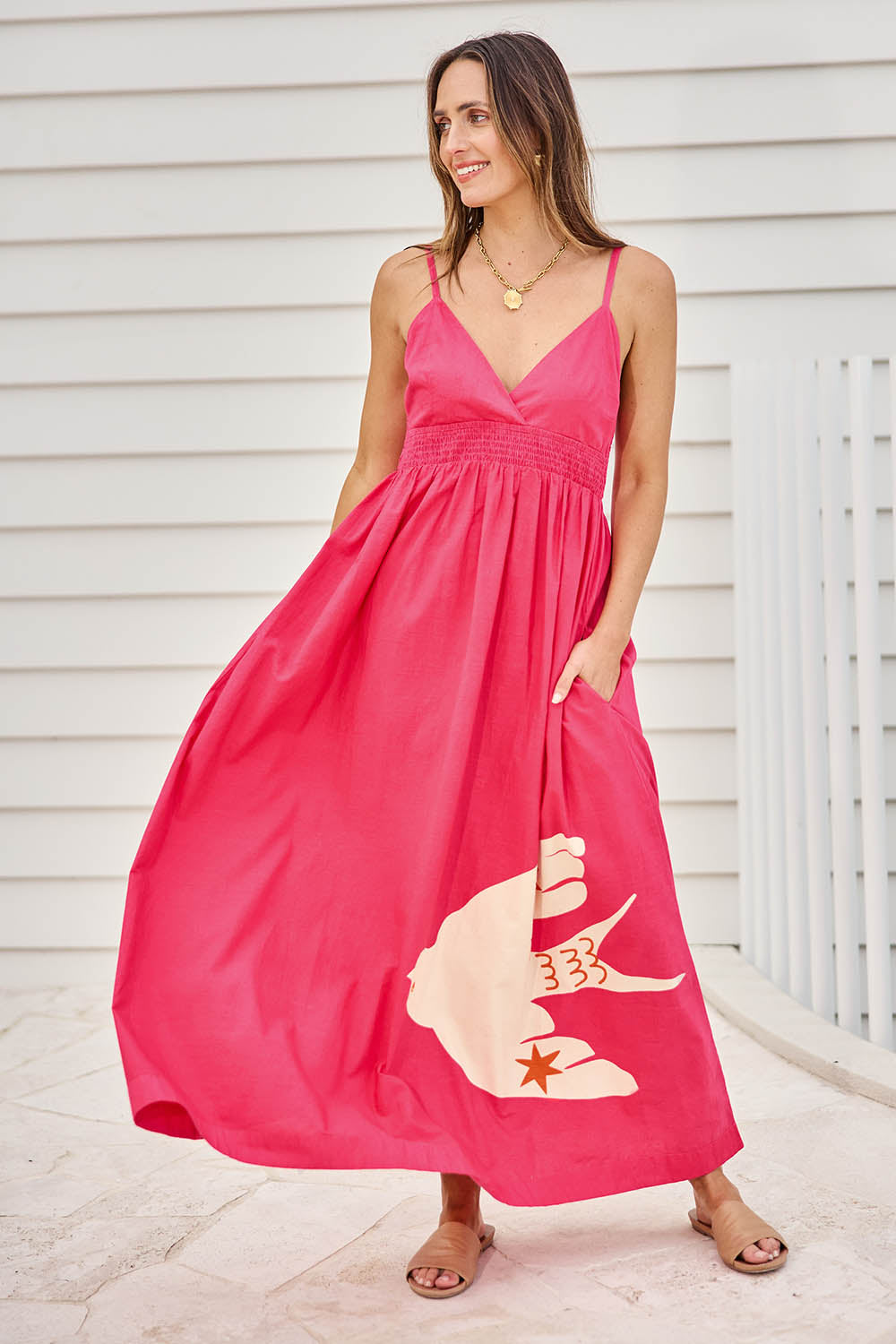 Model Tegand wearing size 10 of the Be My Bird Cotton Poplin Maxi Dress – Rose in colour Rose, from the front