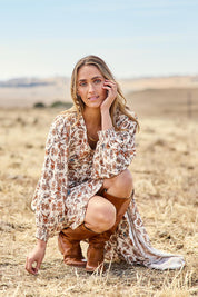Model Larissa wearing size 10 of the Picnic In The Park Dress in colour Rustfleur, from the front, showing the whole outfit