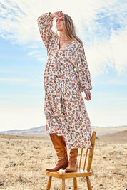 Model Tegan wearing size 10 of the Picnic In The Park Dress in colour Rustfleur, from the front, showing the whole outfit