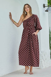 Model Tegand wearing size 10 of the Spotted You One Shoulder Cotton Maxi – Chocolate in colour Chocolate, from the front