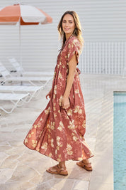 Model Tegand wearing size 10 of the In The Moment Cotton Maxi Dress – Rustrose in colour Rustrose, from the front