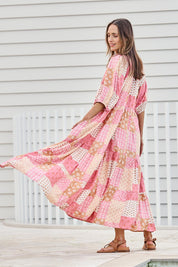 Model Tegand wearing size 10 of the Love Letter Maxi Dress – Petalpatch in colour Petalpatch, from the front