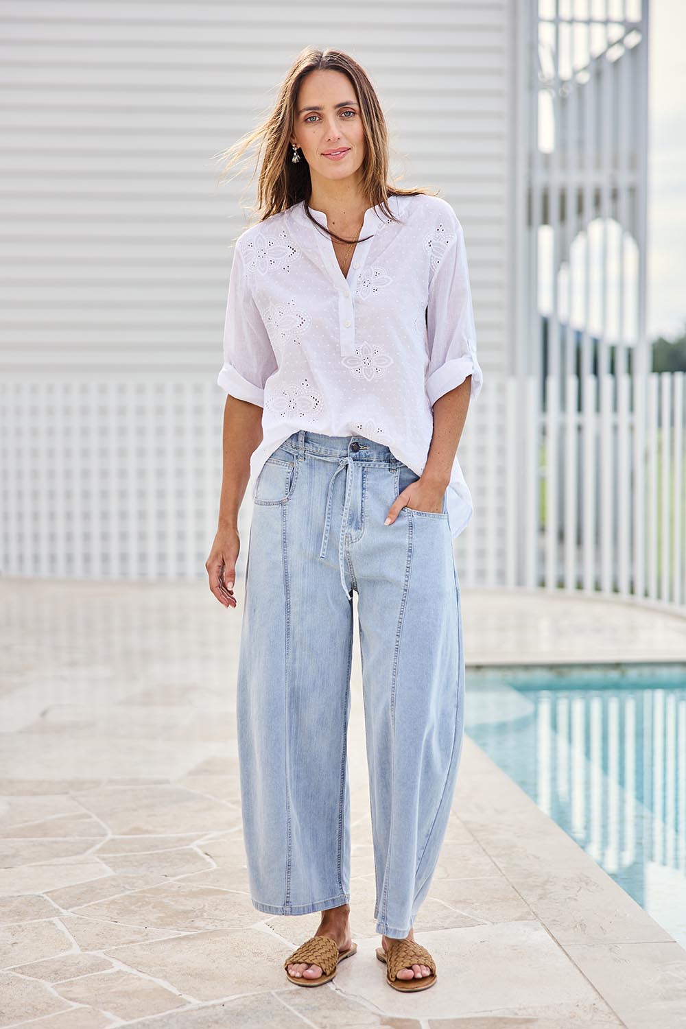 Model Tegand wearing size 10 of the You Make Me Happy Barrel Leg Jeans – Denim in colour Denim, from the front