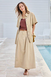 Model Tegand wearing size 10 of the Going Places Denim Shirt Jacket – Sand in colour Sand, from the front
