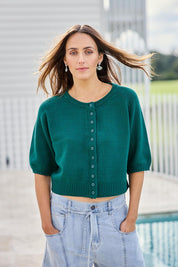 Model Tegand wearing size 10 of the Clear Skies Balloon Sleeve Cardi – Dreamgreen in colour Dreamgreen, in a cropped view