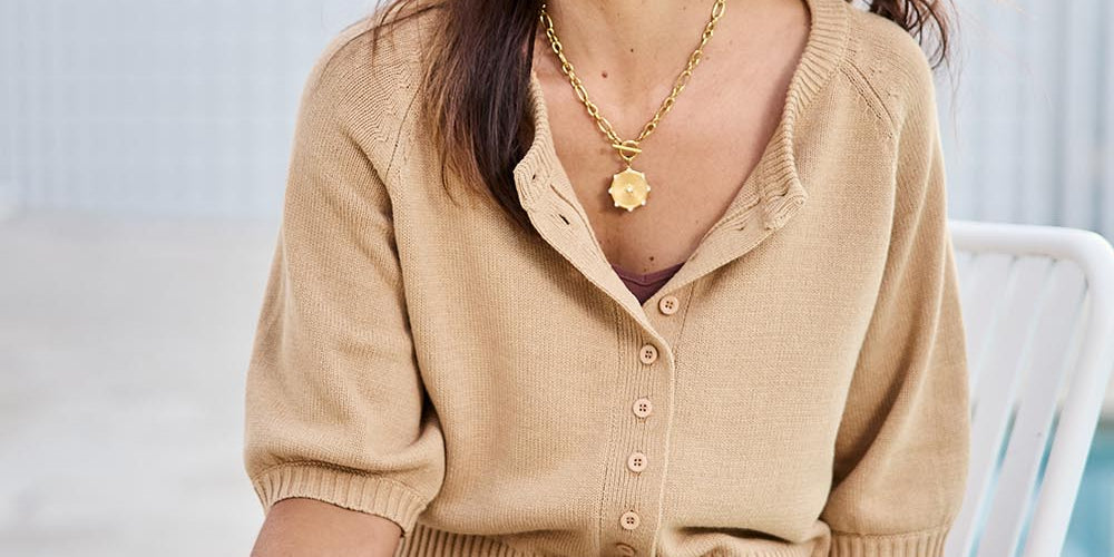 Model Tegand wearing size 10 of the Clear Skies Balloon Sleeve Cardi – Sand in colour Sand, from an angle