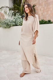 Model Tegand wearing size 10 of the Summer Ready Cotton Overlay Knit Pants – Natural in colour Natural, from the front