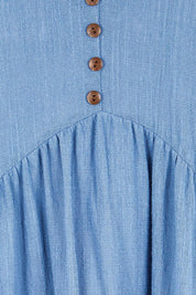 Product shot of the Cute As A Button Cotton Midi Dress – Bluebell in colour Bluebell, showing detail