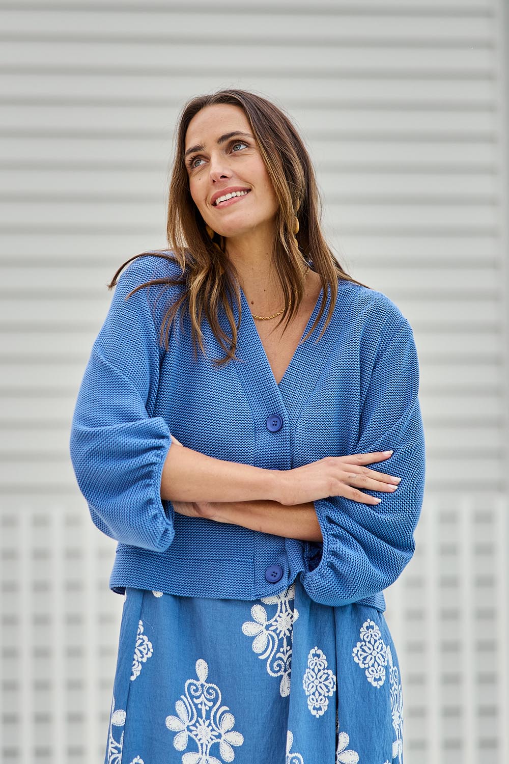 Model Tegand wearing size 10 of the Easy Day Balloon Sleeve Cropped Cardi – Skyblue in colour Skyblue, from an angle