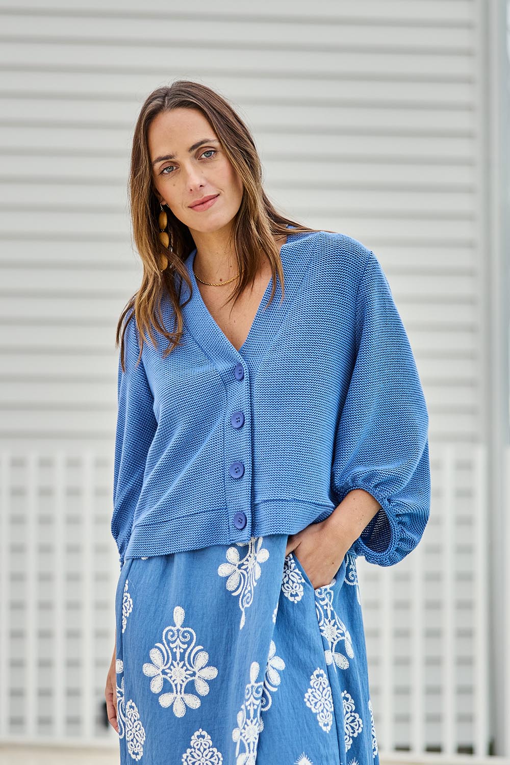 Model Tegand wearing size 10 of the Easy Day Balloon Sleeve Cropped Cardi – Skyblue in colour Skyblue, in a cropped view