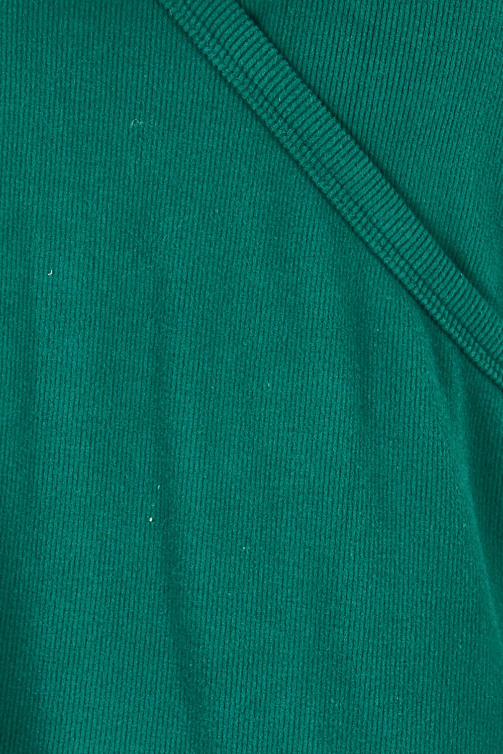 Product shot of the Cross My Heart Sweater – Green in colour Green, showing detail