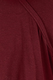 Product shot of the Cross My Heart Sweater – Plum in colour Plum, showing detail