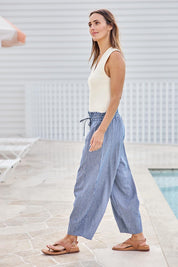 Model Tegand wearing size 10 of the Errand Run Cotton Pull On Pants – Bluestripe in colour Bluestripe, from the front