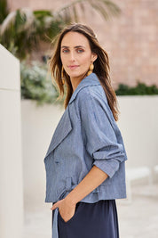 Model Tegand wearing size 10 of the Errand Run Cropped Cotton Trench – Bluestripe in colour Bluestripe, in a cropped view