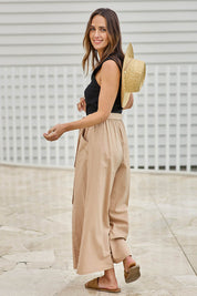 Model Tegand wearing size 10 of the Take Me Anywhere Linen Cotton Wide Leg Pants – Wheat in colour Wheat, from the front