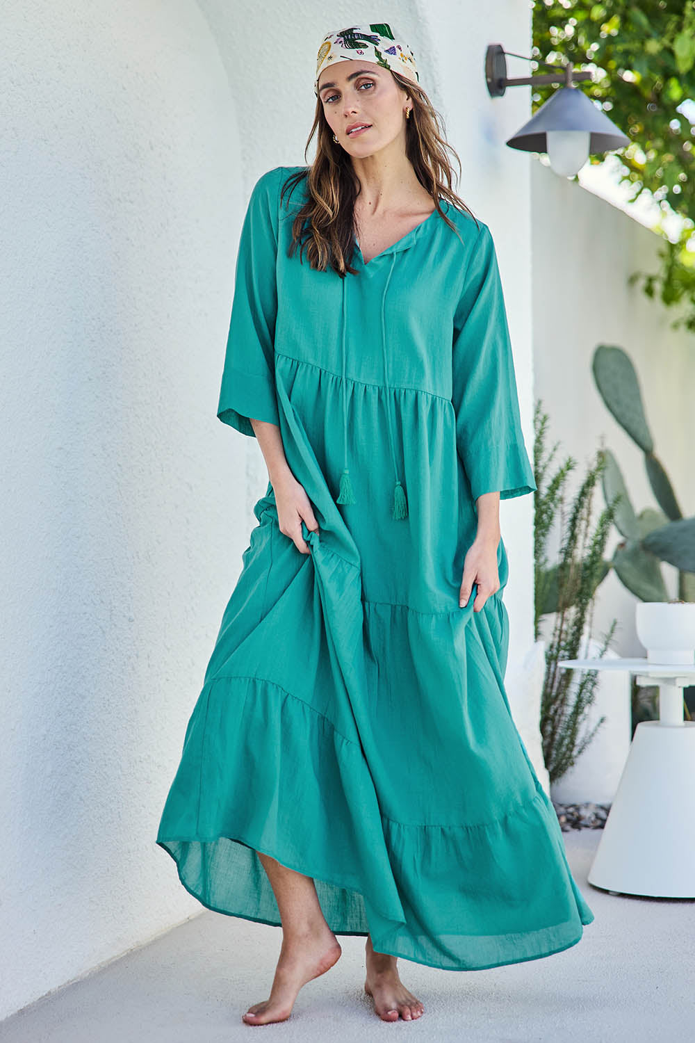 Model Tegand wearing size 10 of the Summer Sun Cotton Maxi Dress – Lagoon in colour Lagoon, from the front