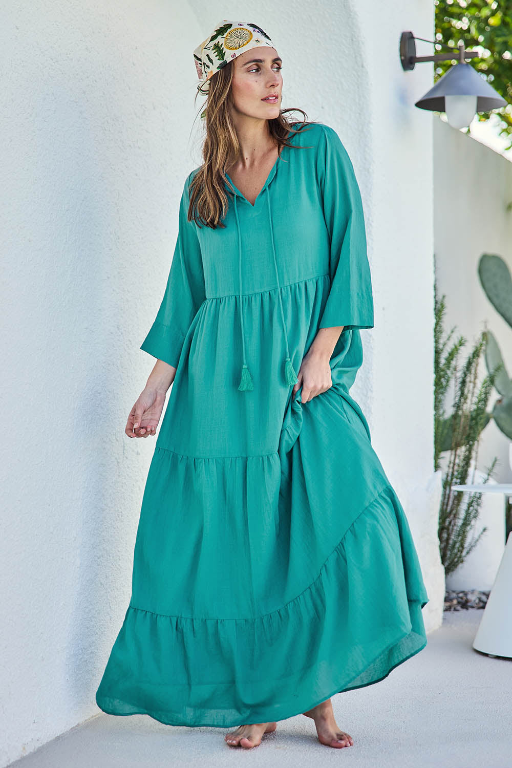 Model Tegand wearing size 10 of the Summer Sun Cotton Maxi Dress – Lagoon in colour Lagoon, from the front