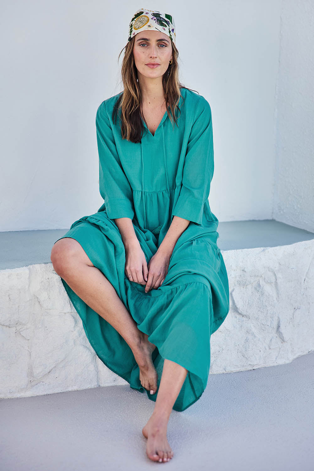 Model Tegand wearing size 10 of the Summer Sun Cotton Maxi Dress – Lagoon in colour Lagoon, from the front