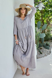 Model Tegand wearing size 10 of the Summer Sun Cotton Maxi Dress – Latte in colour Latte, from the front