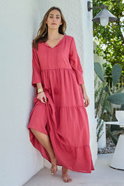 Model Tegand wearing size 10 of the Summer Sun Cotton Maxi Dress – Melon in colour Melon, from the front