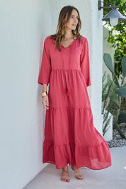 Model Tegand wearing size 10 of the Summer Sun Cotton Maxi Dress – Melon in colour Melon, from the front