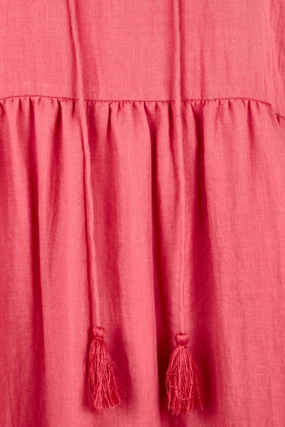 Product shot of the Summer Sun Cotton Maxi Dress – Melon in colour Melon, showing detail