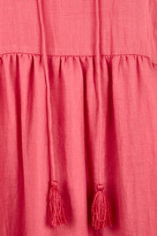 Product shot of the Summer Sun Cotton Maxi Dress – Melon in colour Melon, showing detail