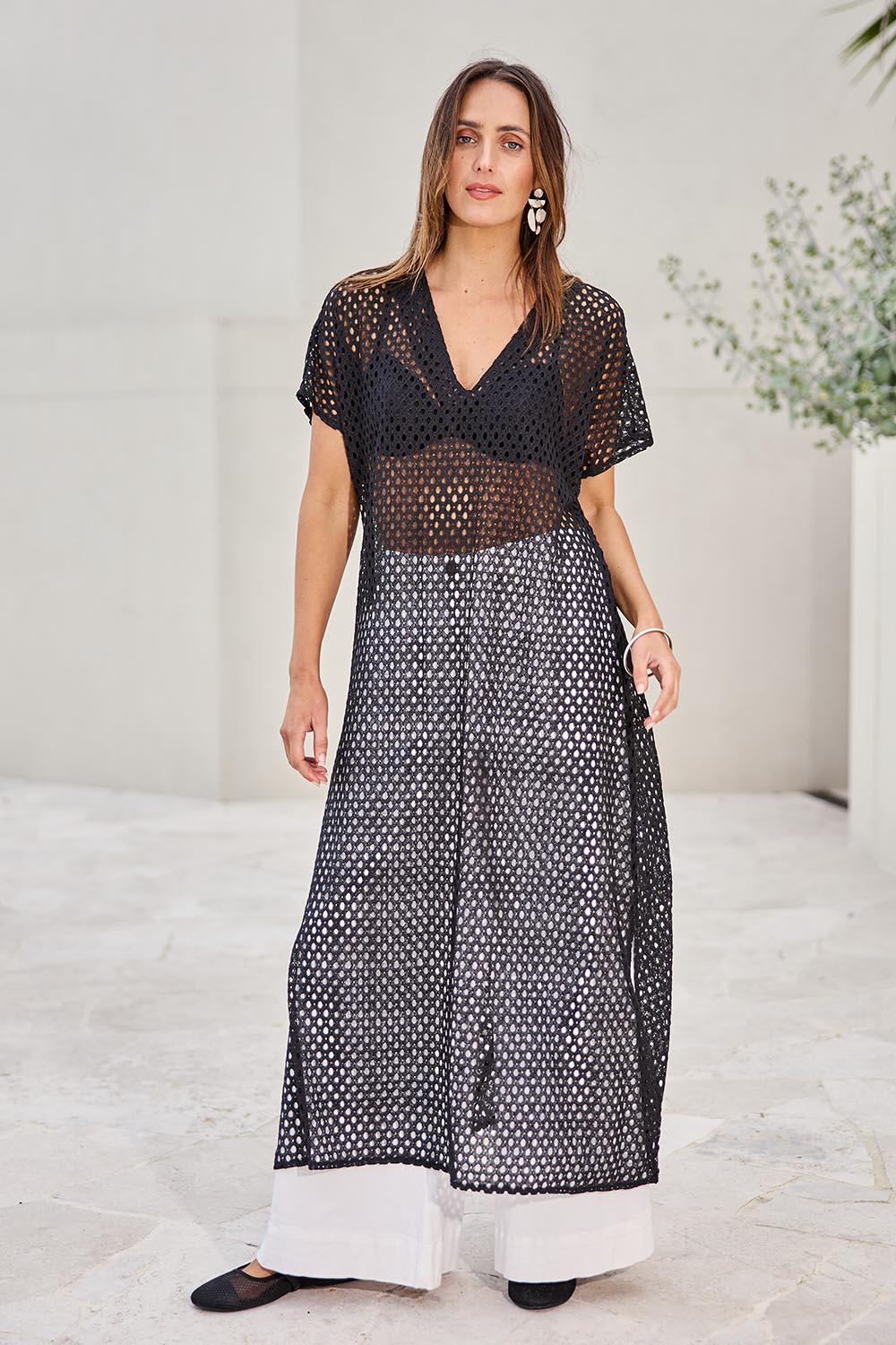 Model Tegand wearing size 10 of the Wear Your Own Way Maxi Dress – Black in colour Black, from the front