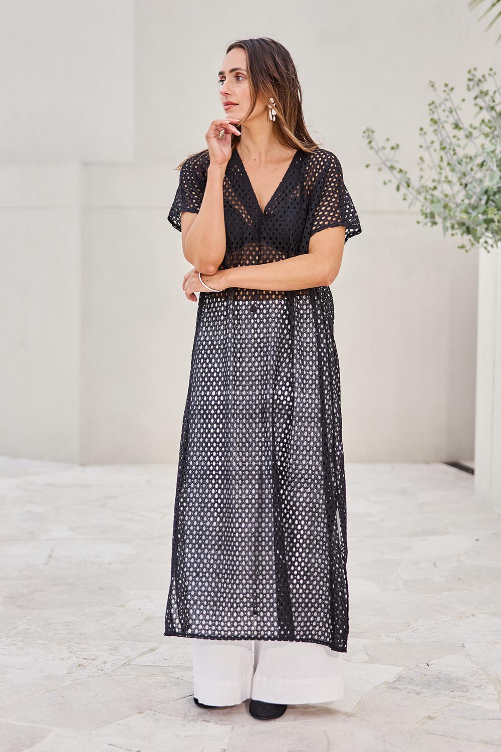 Model Tegand wearing size 10 of the Wear Your Own Way Maxi Dress – Black in colour Black, from the front