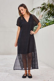 Model Tegand wearing size 10 of the Wear Your Own Way Maxi Dress – Black in colour Black, from the front