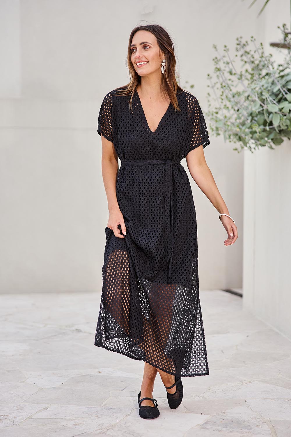 Model Tegand wearing size 10 of the Wear Your Own Way Maxi Dress – Black in colour Black, from the front